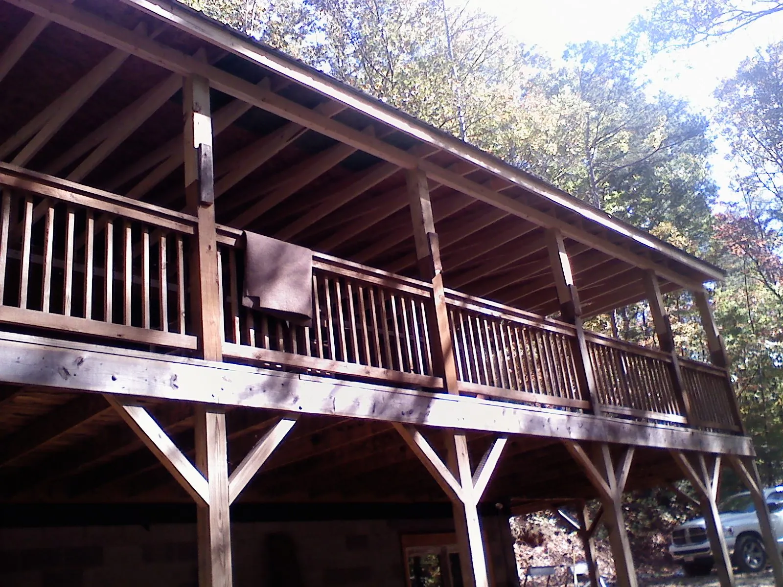 Timber framing under a new elevated porch and deck — Roof Leak Repair in Iberia by Roofing Brothers